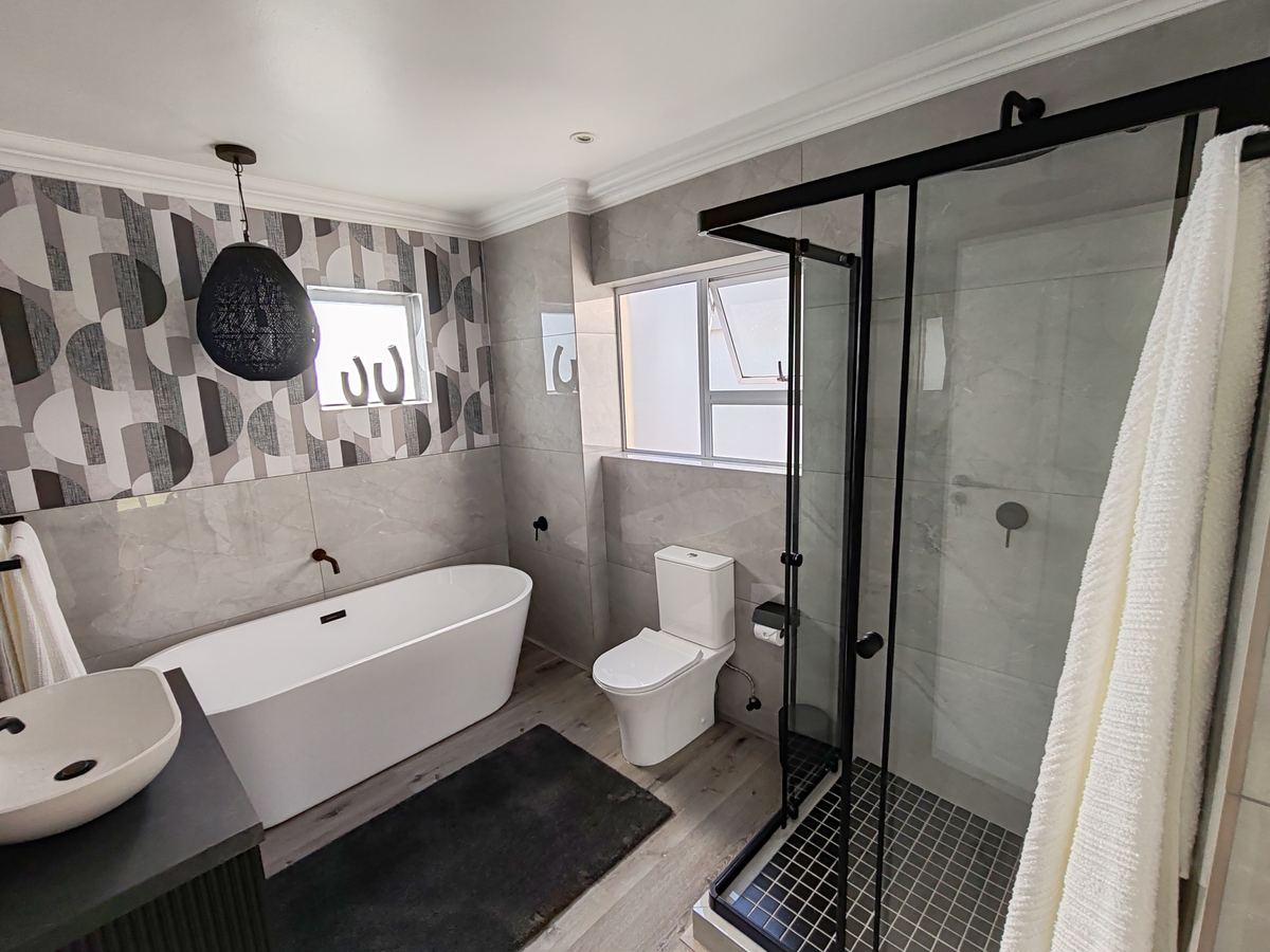 Bathroom renovation tiling and fixtures completed