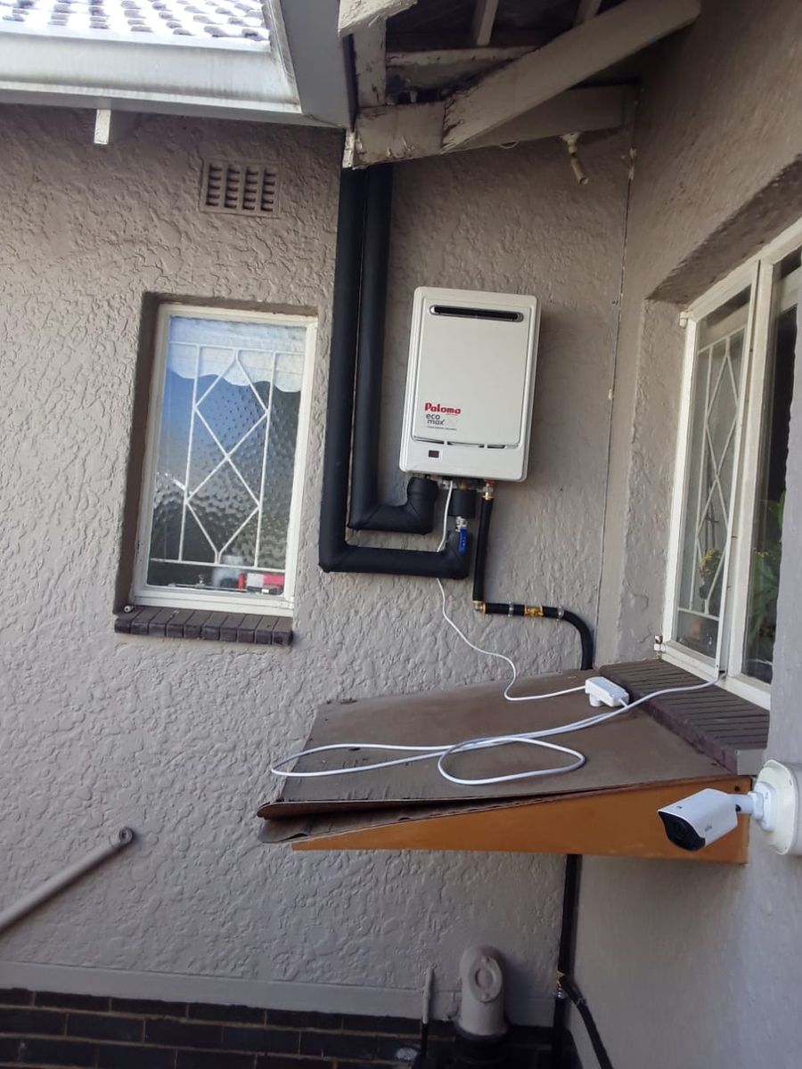 Gas geyser installation on exterior wall of Randburg home