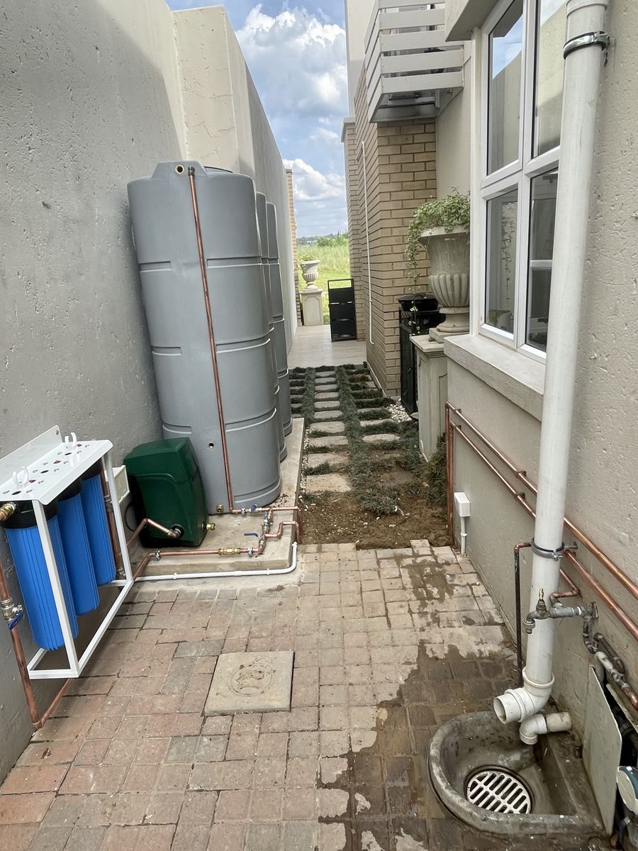 Complete water tank plumbing connection with booster pump in Fairland