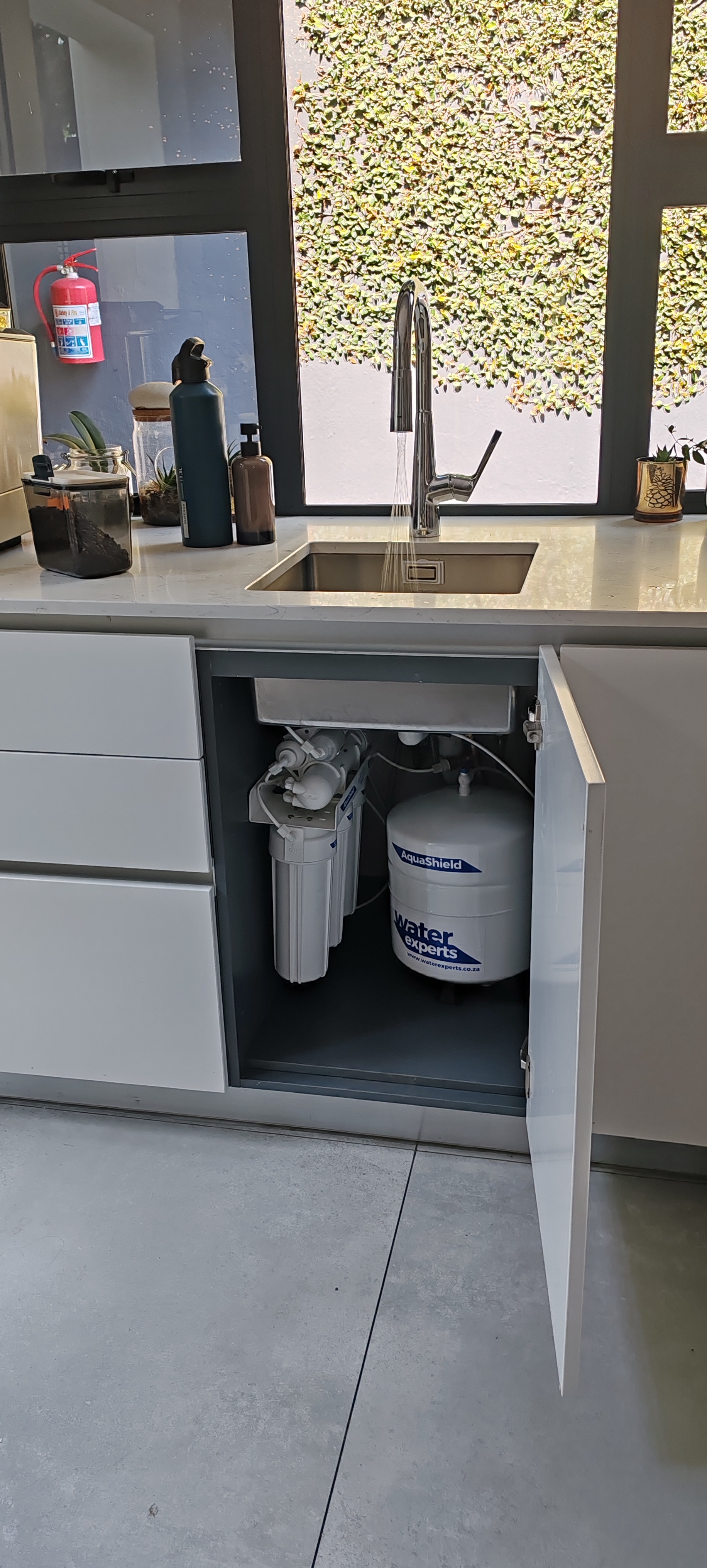 AquaShield installation under-sink neat pipework