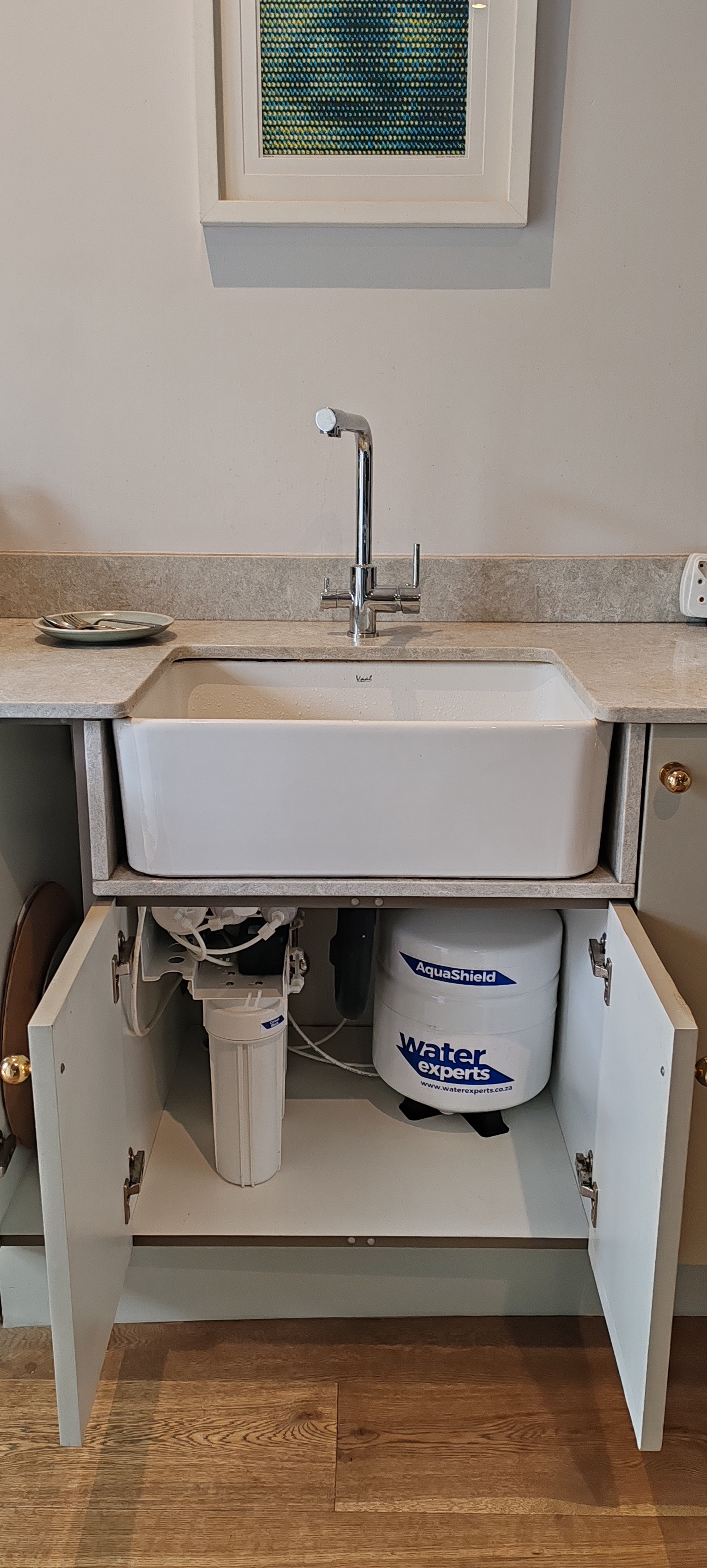 AquaShield system with dedicated tap