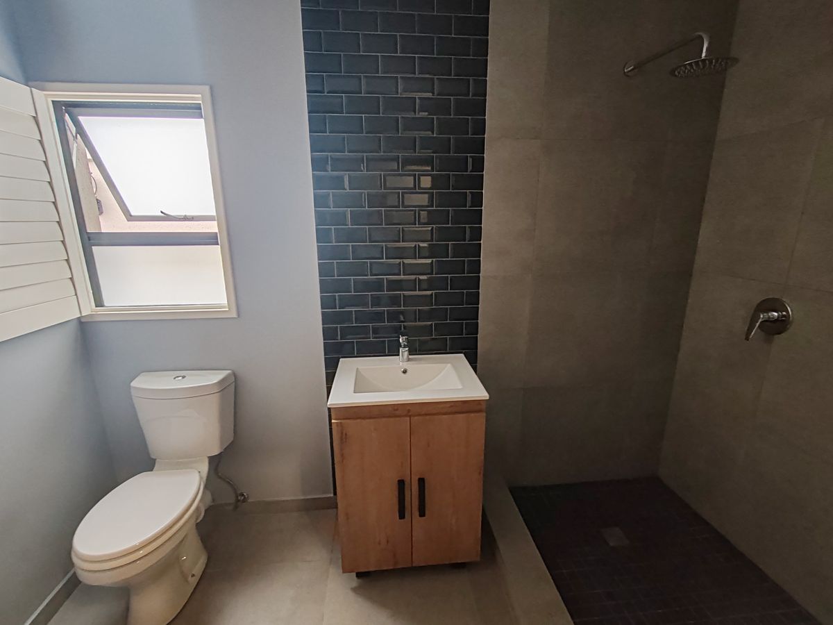 Andy Plumbers collecting water sample from JoJo tank in Randburg