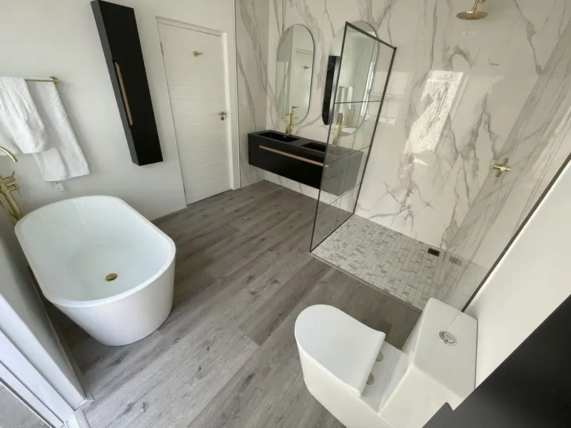 Bathroom floor tiling installation in Fairland home