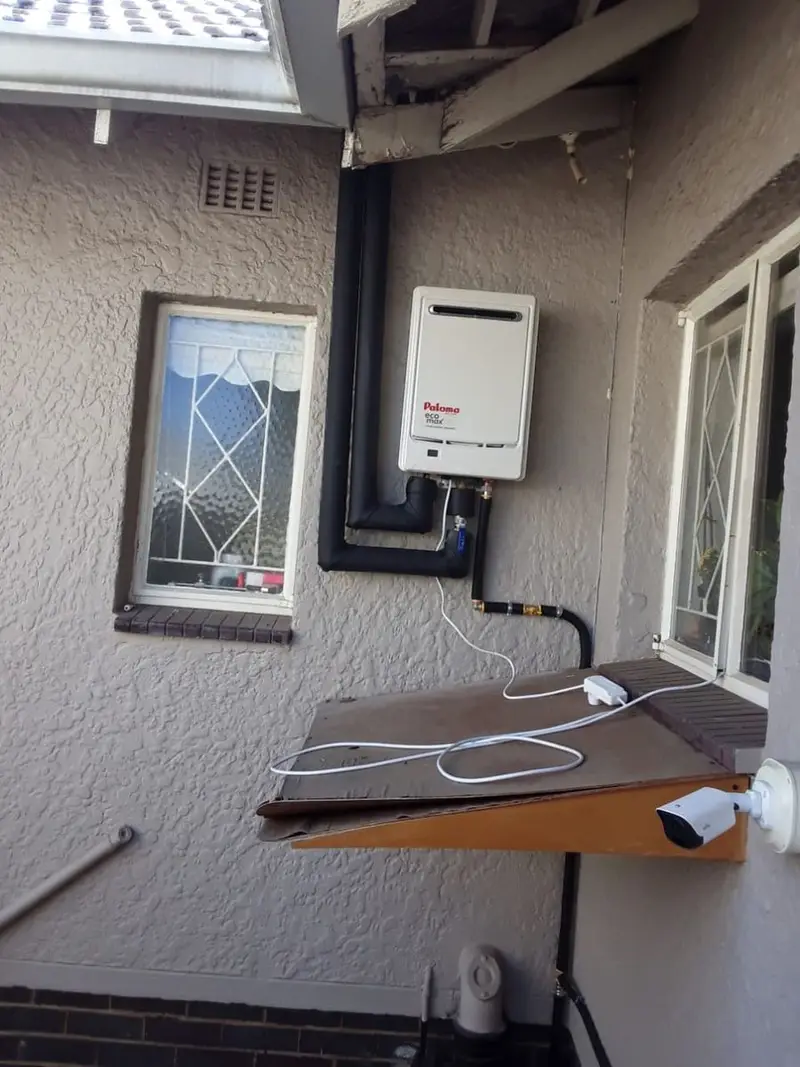 Gas geyser installation on exterior wall of Randburg home